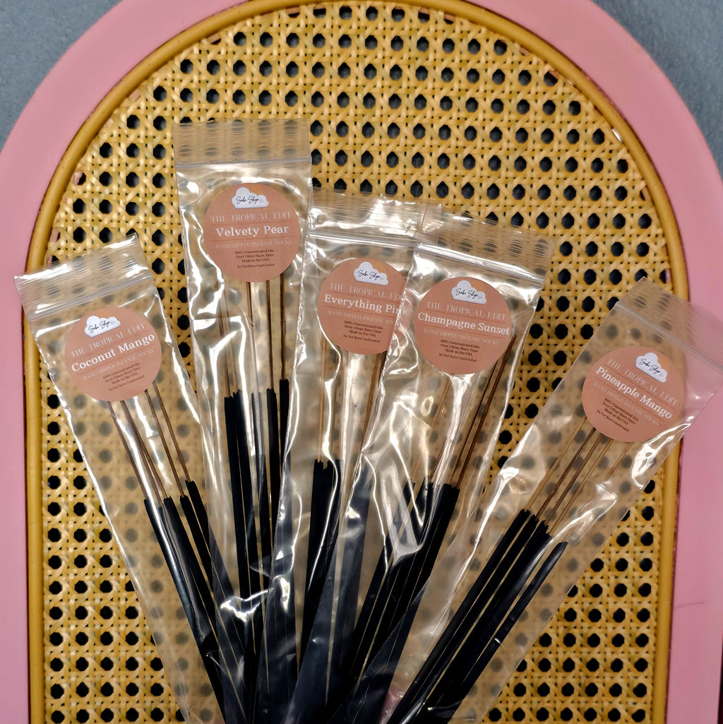 Five incense scent bundles arranged showing Pineapple Mango, Everything Pink, Velvety Pear, Coconut Mango and Champagne Sunset packaging